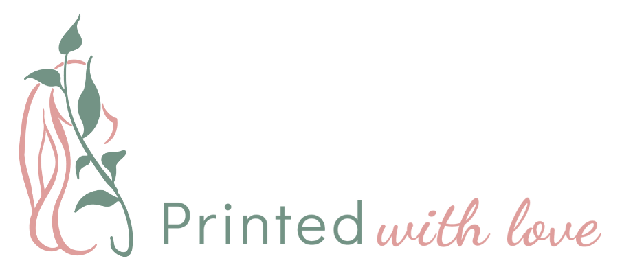 Printed With Love Logo. A pink line art silhouette of a woman's figure with green leaves 'climbing' up the pink silhouette. The text reads "Printed With Love"